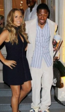 Gabriel Cannon brother Nick Cannon with Mariah Carey at an Event.